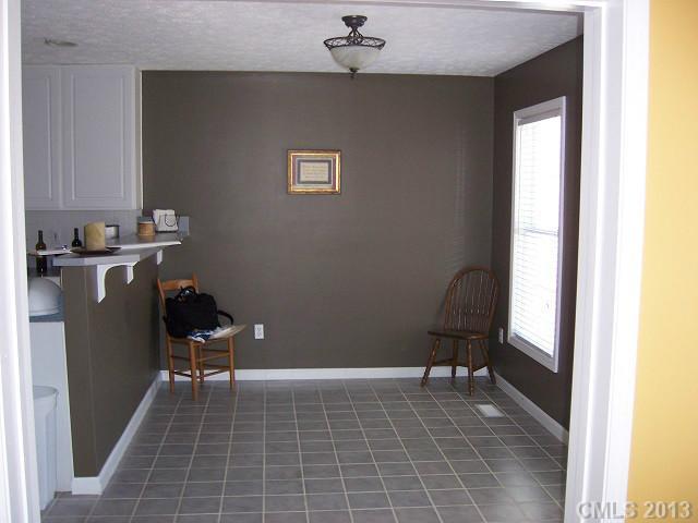 646 Mereva Road Smyrna, SC 29743 - Photo 7 of 15 a view of a workspace with furniture and a window