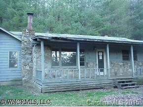 80 Creekside Loop Road Waynesville, NC 28786 - Photo 1 of 9 a front view of a house with a yard