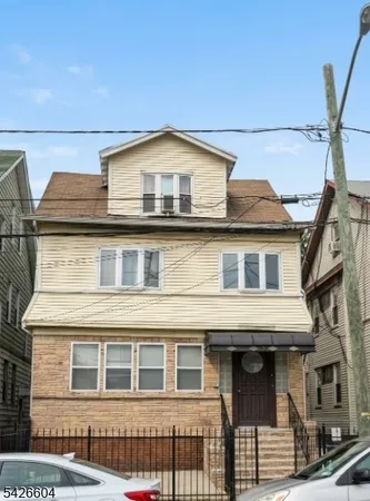 a view of a house with a balcony