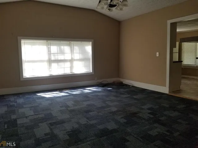 a view of a livingroom with a window
