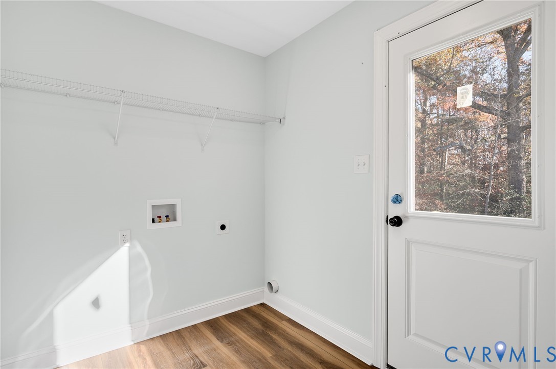 2321 Rock Island Road Scottsville, VA 24590 - Photo 13 of 24 a view of small space with wooden floor and fan