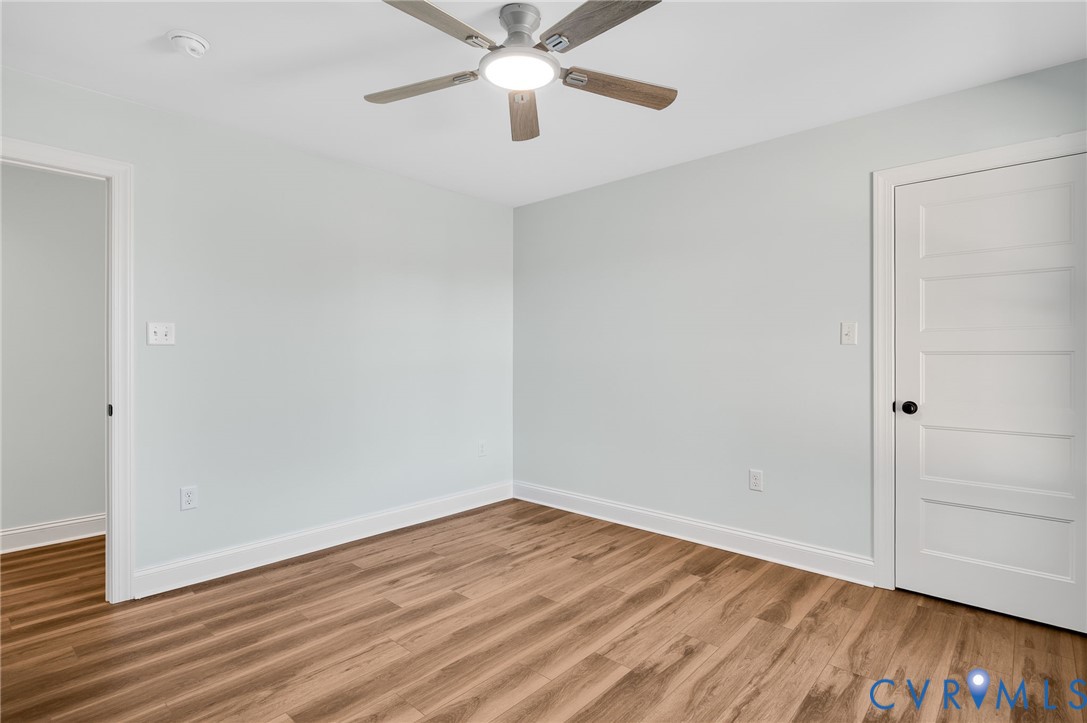 2321 Rock Island Road Scottsville, VA 24590 - Photo 21 of 24 wooden floor in an empty room