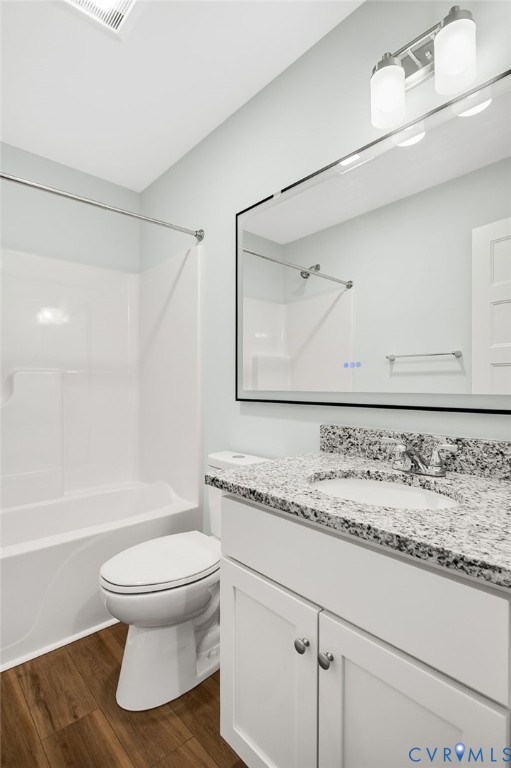 2321 Rock Island Road Scottsville, VA 24590 - Photo 24 of 24 a bathroom with a granite countertop sink toilet mirror vanity and bathtub