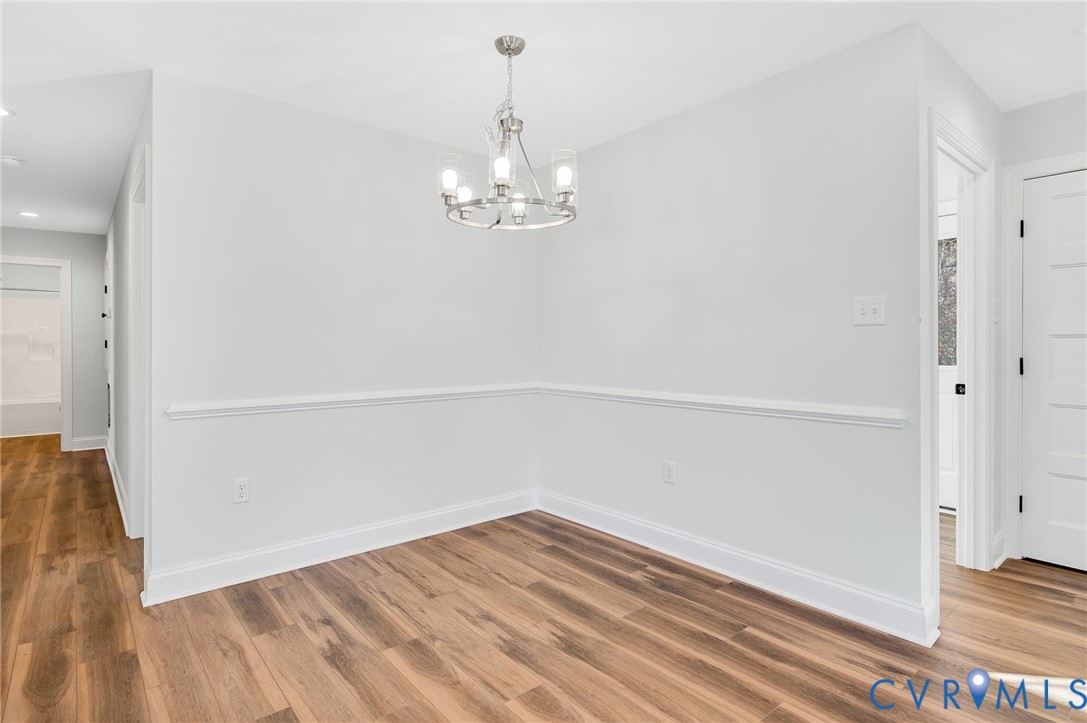2321 Rock Island Road Scottsville, VA 24590 - Photo 9 of 24 wooden floor in an empty room