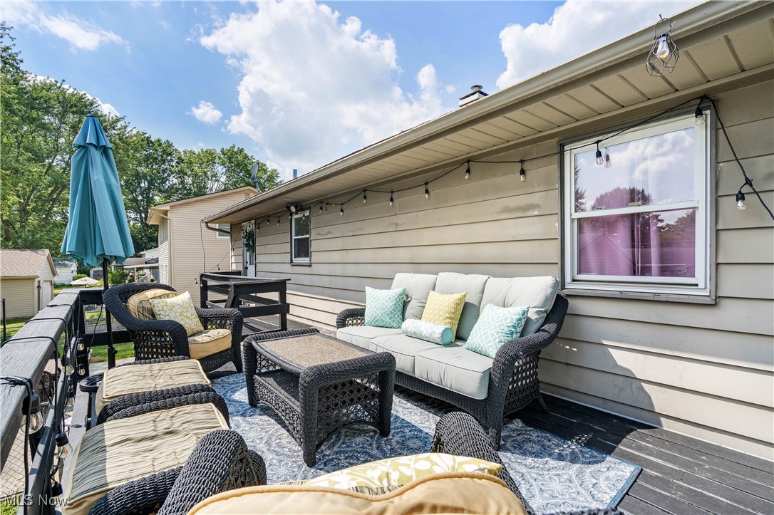 4815 New Road Youngstown, OH 44515 - Photo 35 of 41 Wooden deck with an outdoor hangout area