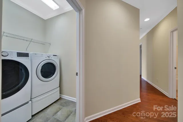 a utility room with dryer and washer