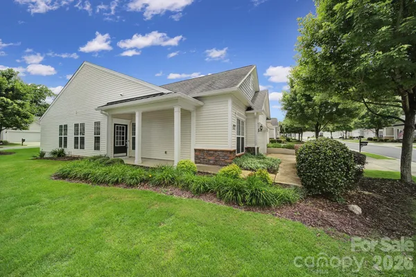 a view of a yard in front of house