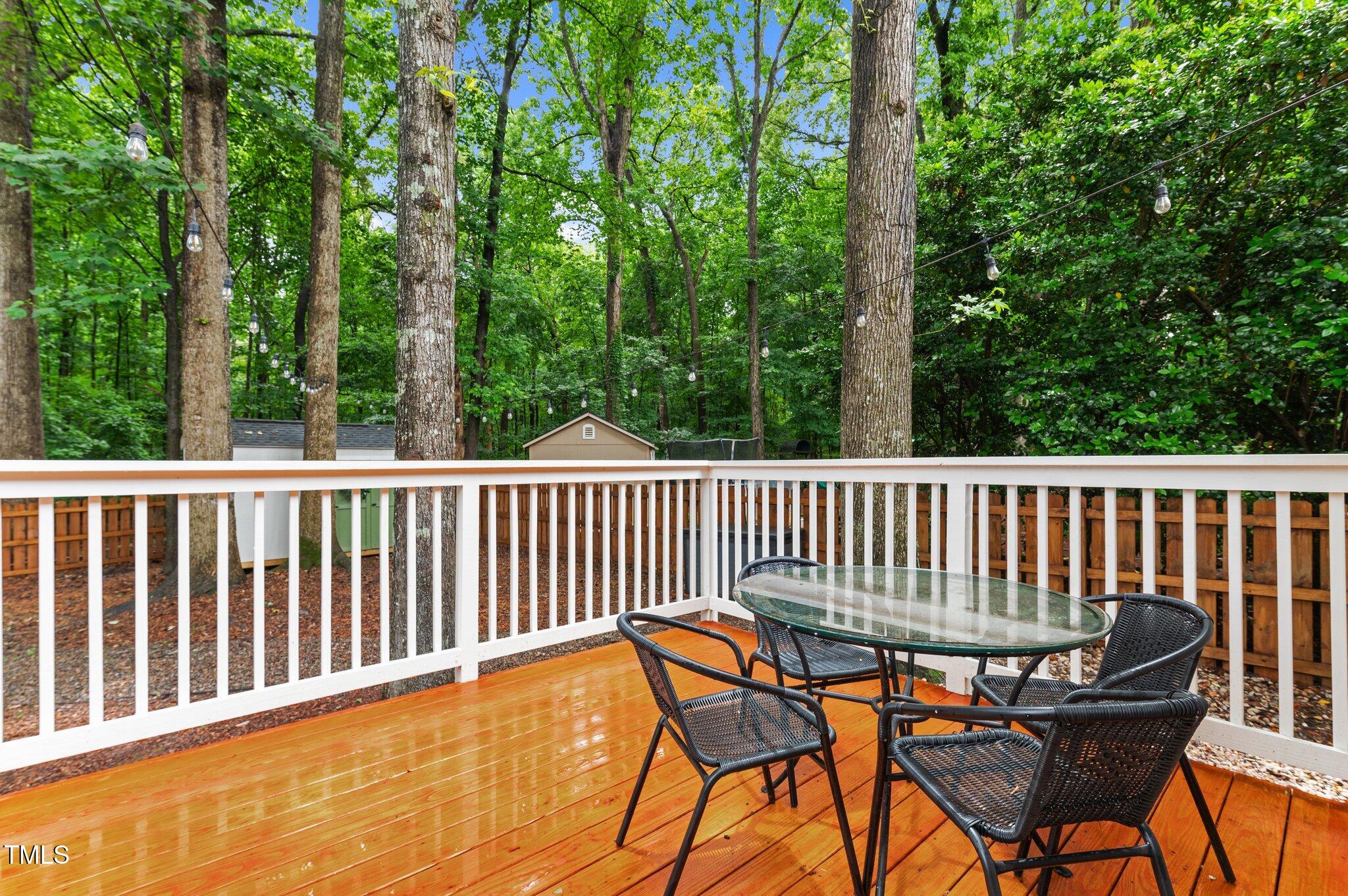 3016 Bolo Trail Raleigh, NC 27615 - Photo 23 of 28 a view of a chair and table in the balcony