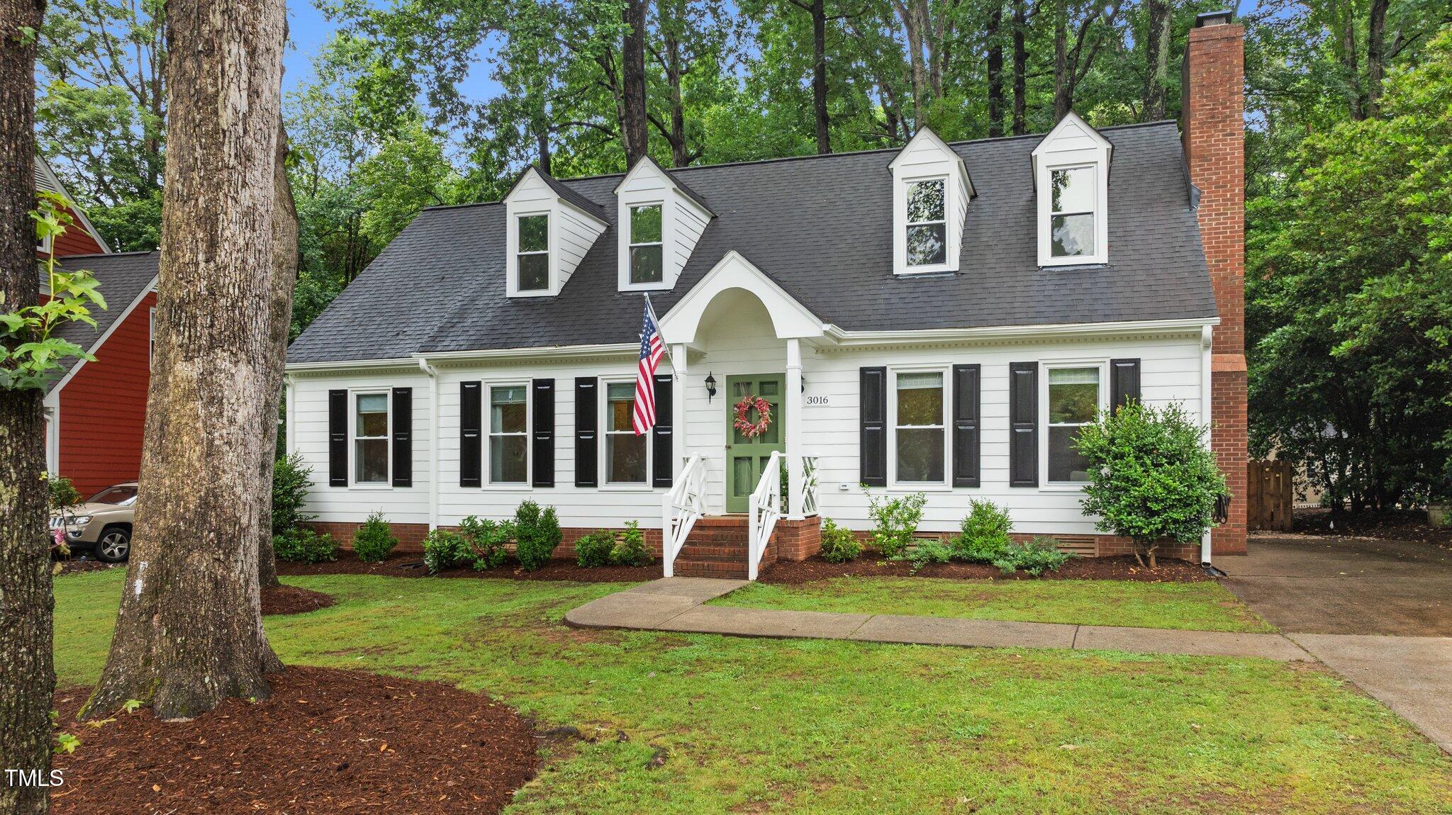 3016 Bolo Trail Raleigh, NC 27615 - Photo 25 of 28 a front view of a house with a yard