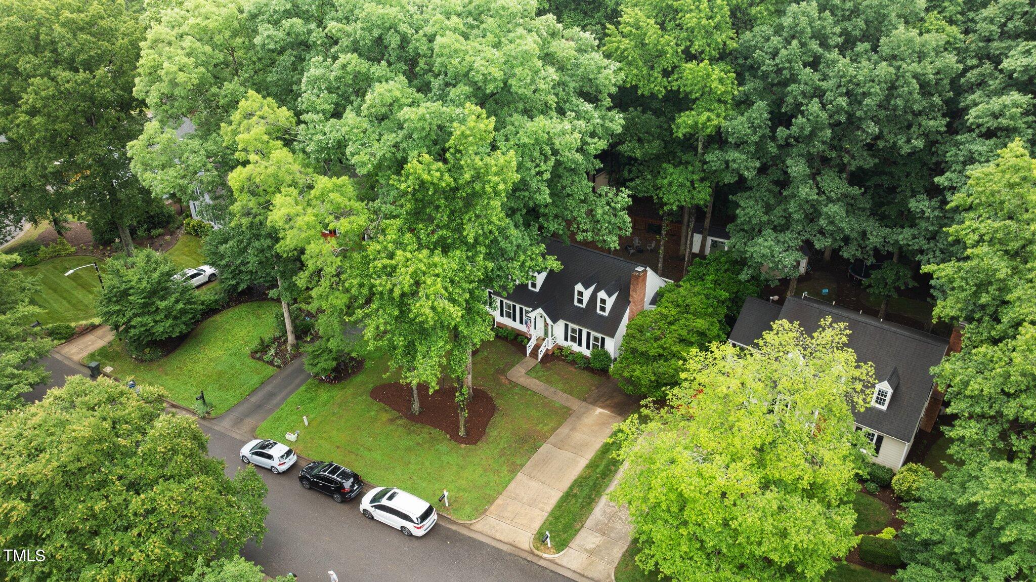 3016 Bolo Trail Raleigh, NC 27615 - Photo 27 of 28 an aerial view of a house with a yard