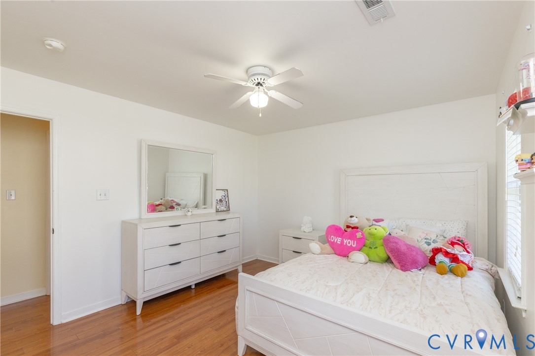 5101 Spring Bluff Road Midlothian, VA 23112 - Photo 36 of 47 Bright bedroom featuring wood-finish flooring and