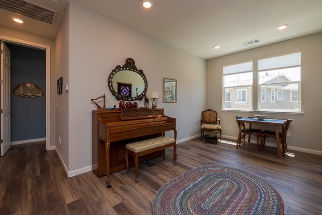 107 Wallace Circle Moraga, CA 94556 - Photo 14 of 18 a living room with furniture a piano and a wooden floor