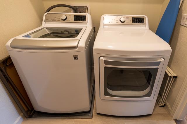 107 Wallace Circle Moraga, CA 94556 - Photo 18 of 18 a utility room with dryer and washer