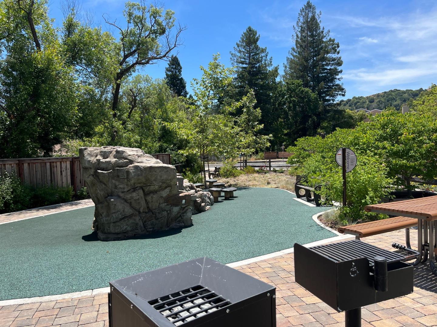 107 Wallace Circle Moraga, CA 94556 - Photo 6 of 18 a view of a backyard with table and chairs and a fire pit