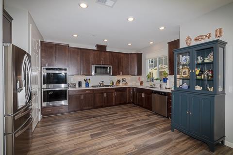 107 Wallace Circle Moraga, CA 94556 - Photo 7 of 18 a kitchen with stainless steel appliances wooden cabinets a stove top oven and refrigerator