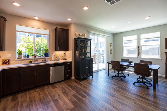 107 Wallace Circle Moraga, CA 94556 - Photo 8 of 18 a kitchen with a table chairs refrigerator and dining table
