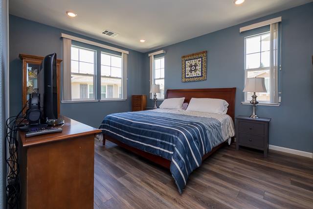 107 Wallace Circle Moraga, CA 94556 - Photo 10 of 18 a bedroom with a bed and a dresser next to a window