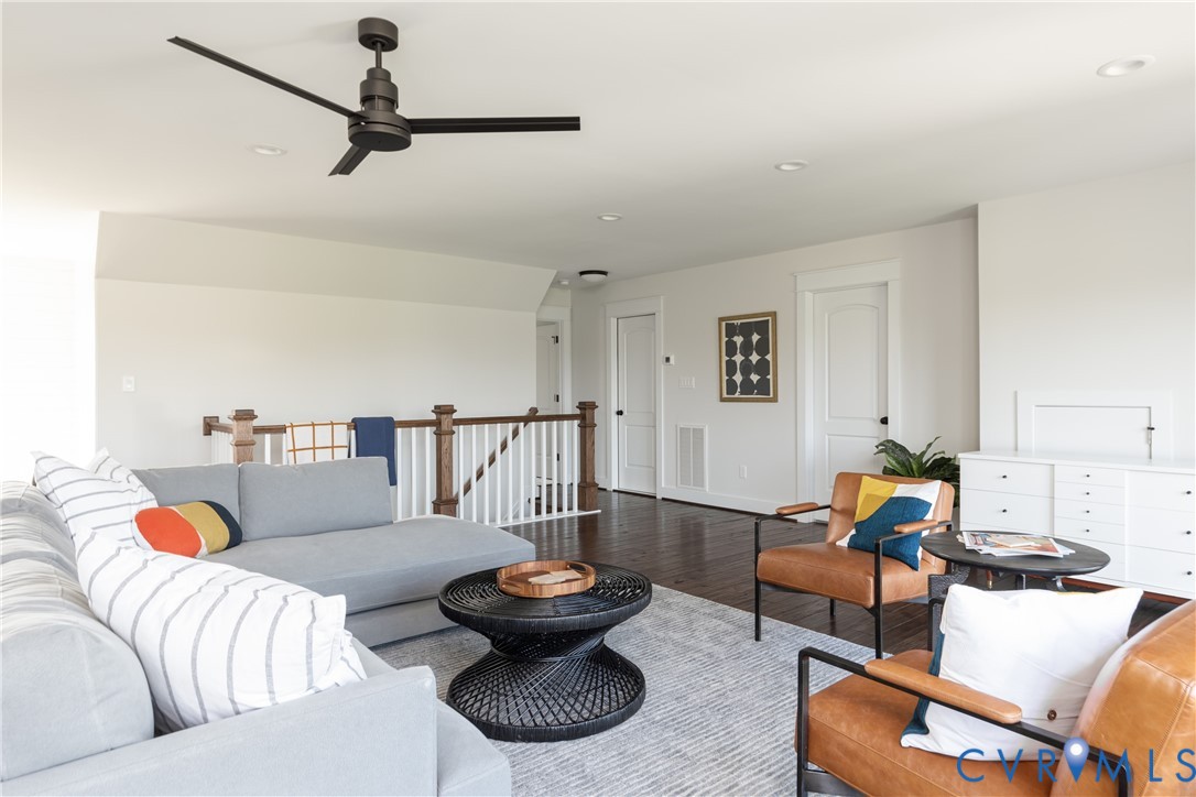 16852 Sheppards Fold Way Beaverdam, VA 23015 - Photo 22 of 30 a living room with furniture and a lamp