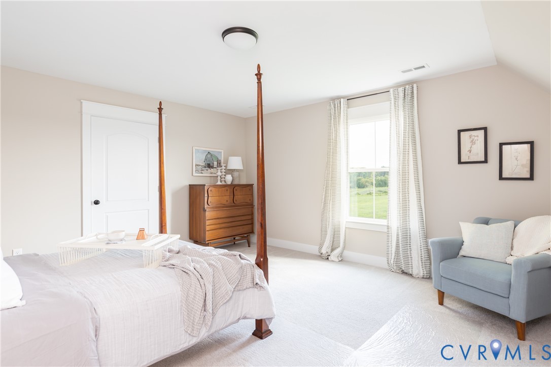 16852 Sheppards Fold Way Beaverdam, VA 23015 - Photo 26 of 30 a bedroom with a bed and a couch