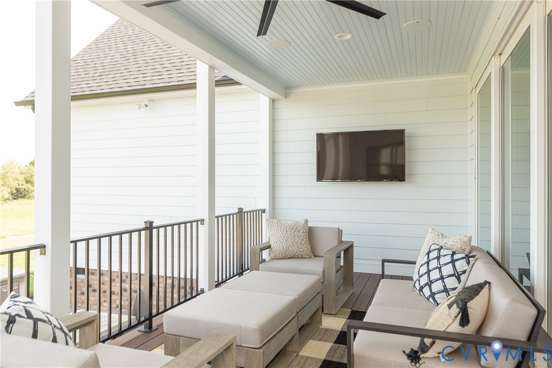 16852 Sheppards Fold Way Beaverdam, VA 23015 - Photo 29 of 30 a living room with couches and a flat screen tv