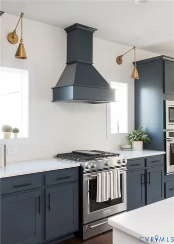 a kitchen with a stove and a sink