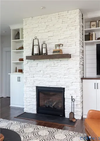 a living room with a fireplace