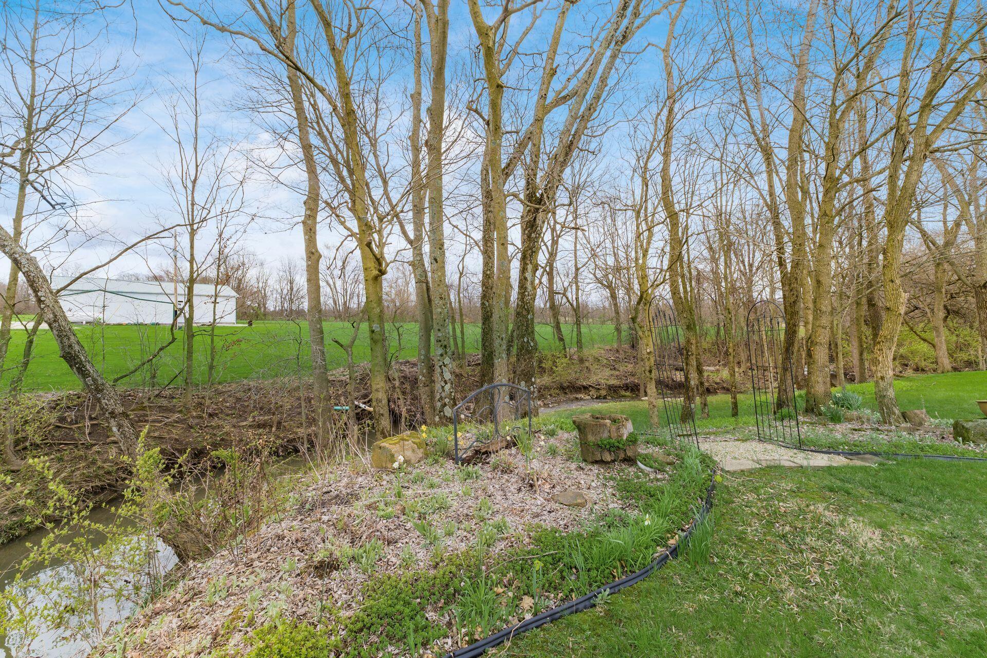 10950 Heimberger Road Northwest Baltimore, OH 43105 - Photo 11 of 45 Landscaping On The Creek Bed