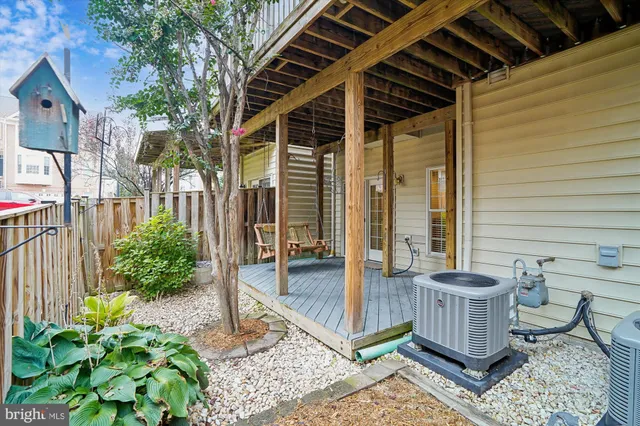 a view of house with a chairs and wooden floor