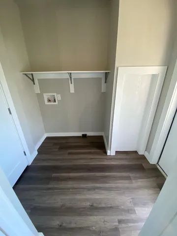 a view of house with a yard