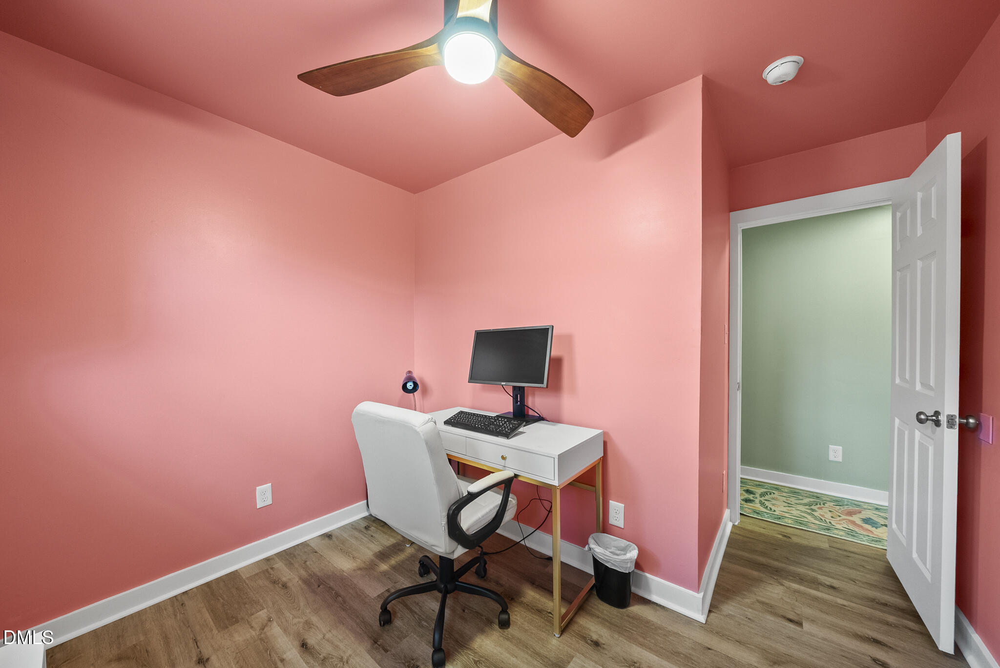 1002 Bacon Street Durham, NC 27703 - Photo 18 of 31 a workspace with furniture and wooden floor