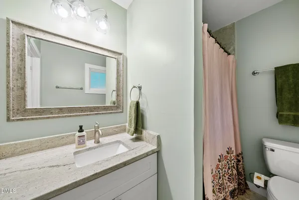 a view of backyard and tree