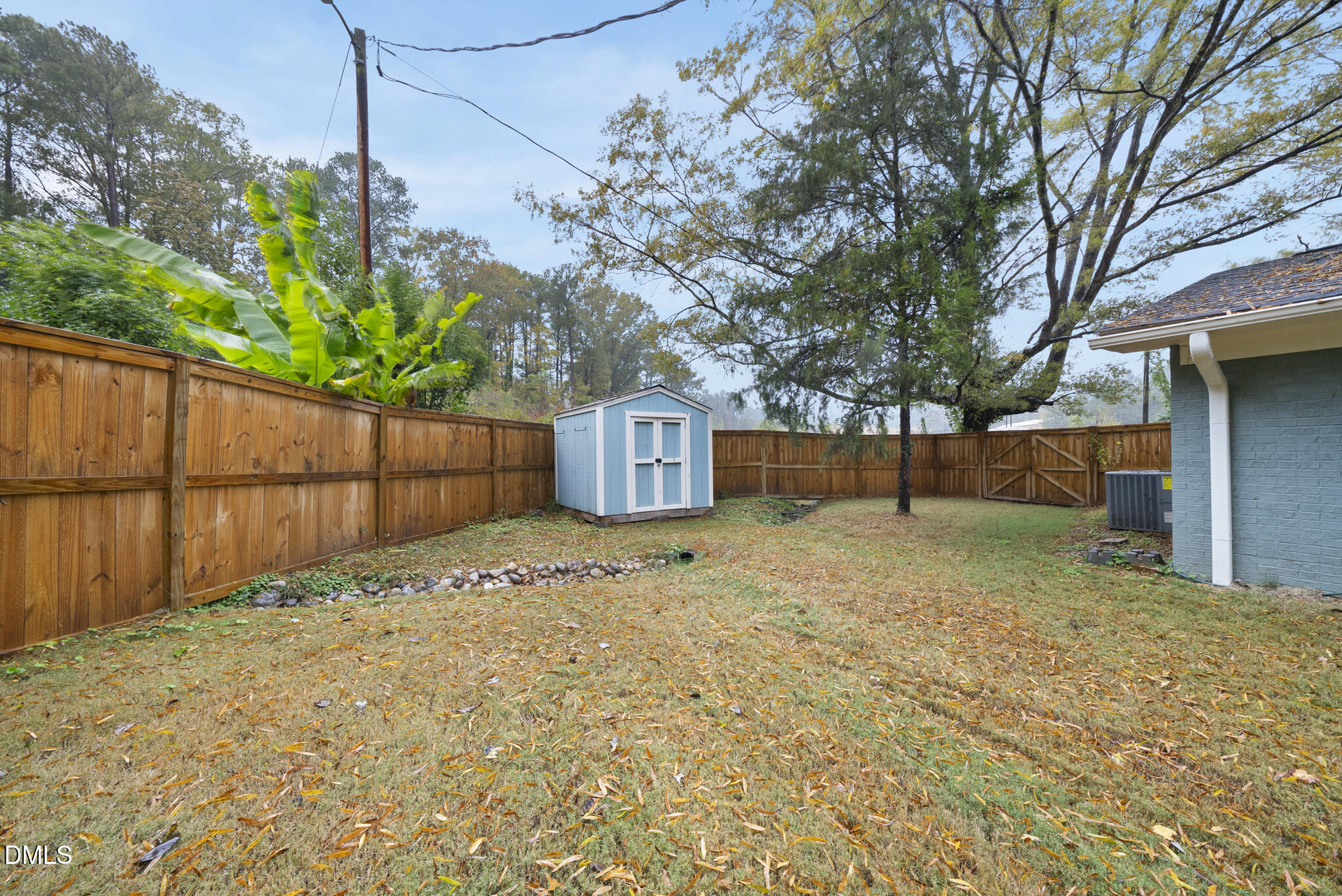1002 Bacon Street Durham, NC 27703 - Photo 27 of 31 a backyard of a house