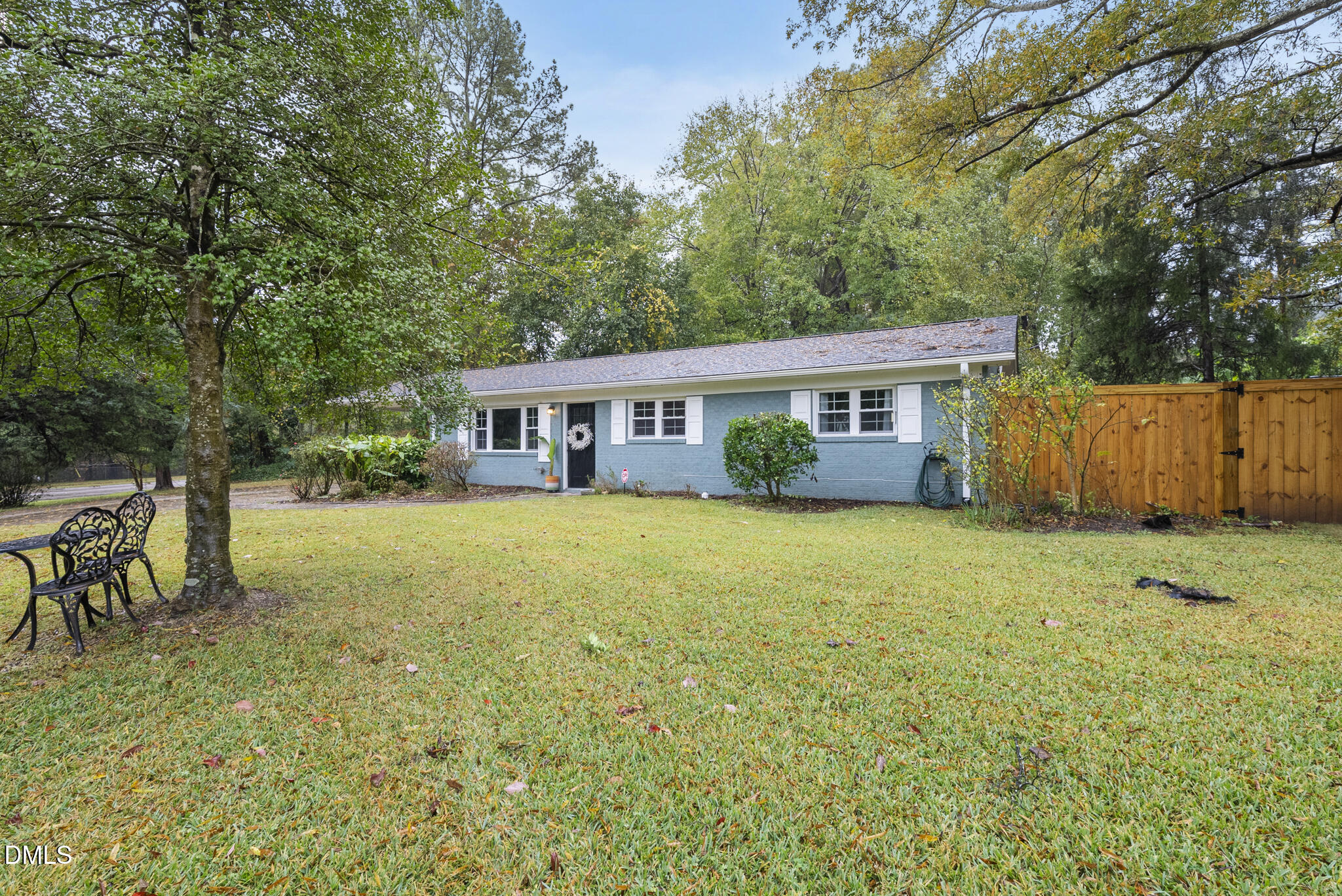 1002 Bacon Street Durham, NC 27703 - Photo 31 of 31 a view of a house with backyard and sitting area