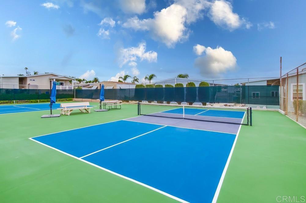 650 South Rancho Santa Fe Road, Unit 291 San Marcos, CA 92078 - Photo 39 of 48 a view of a tennis court