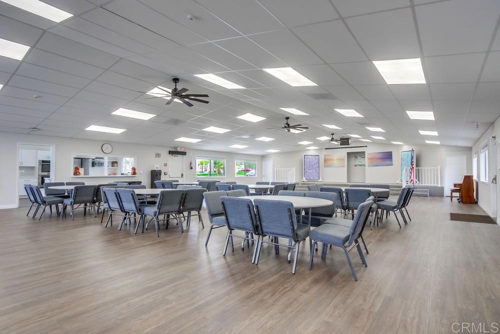 650 South Rancho Santa Fe Road, Unit 291 San Marcos, CA 92078 - Photo 42 of 48 a group of people sitting at tables in a room
