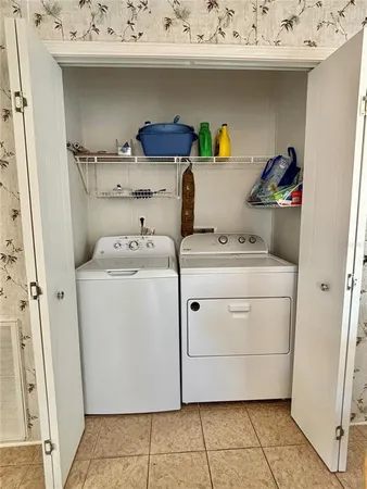 a utility room with a washer and dryer