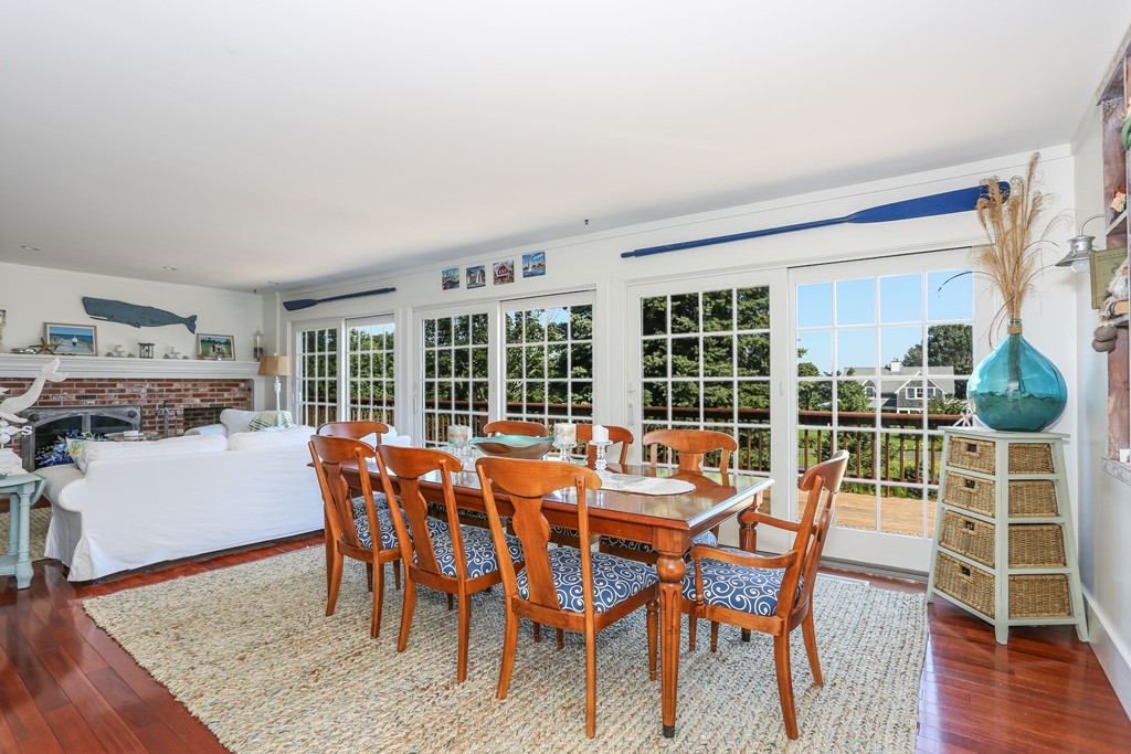 75 Deacon Court Barnstable, MA 02630 - Photo 11 of 30 a dining room with furniture window and wooden floor