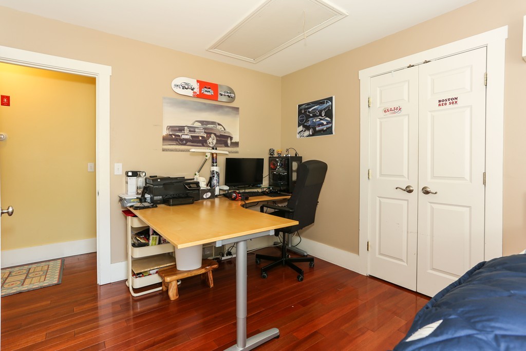 75 Deacon Court Barnstable, MA 02630 - Photo 17 of 30 a view of a room with furniture and wooden floor