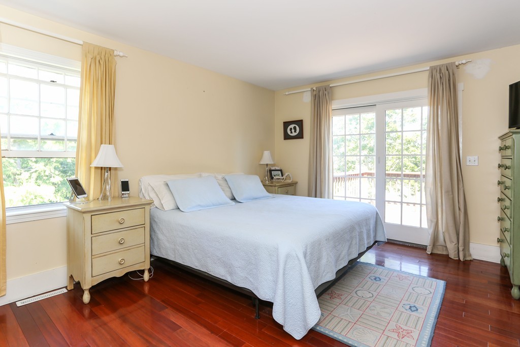 75 Deacon Court Barnstable, MA 02630 - Photo 19 of 30 a bedroom with a bed and a window