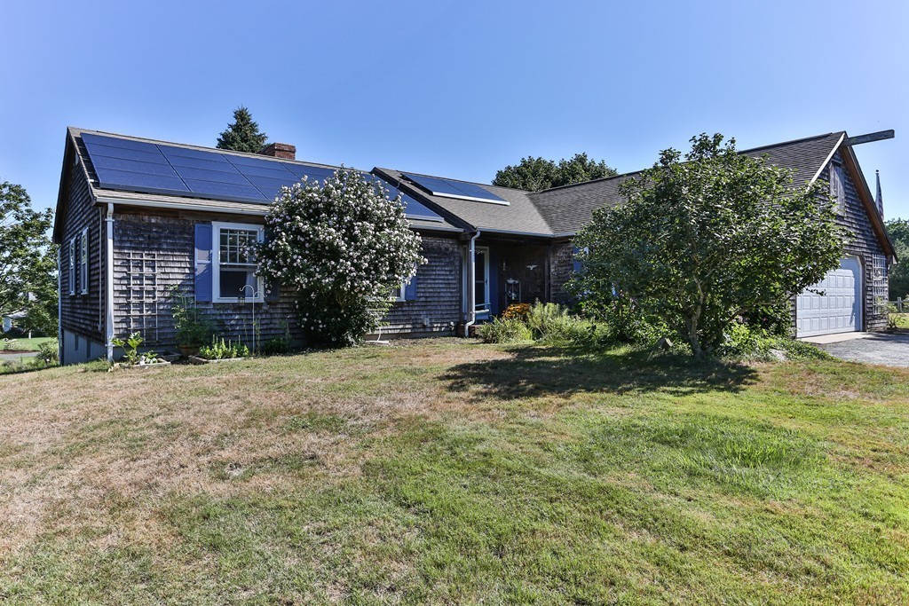 75 Deacon Court Barnstable, MA 02630 - Photo 2 of 30 a view of a house with a yard and potted plants