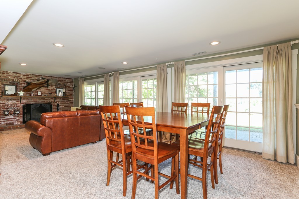 75 Deacon Court Barnstable, MA 02630 - Photo 22 of 30 a dining room with furniture and large windows