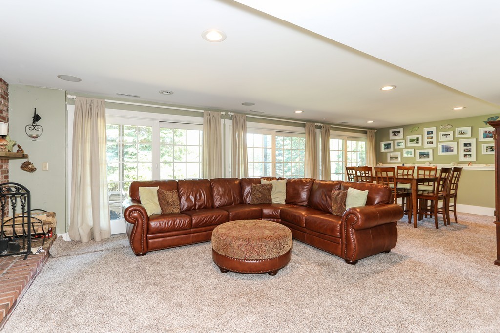 75 Deacon Court Barnstable, MA 02630 - Photo 25 of 30 a living room with furniture and a large window