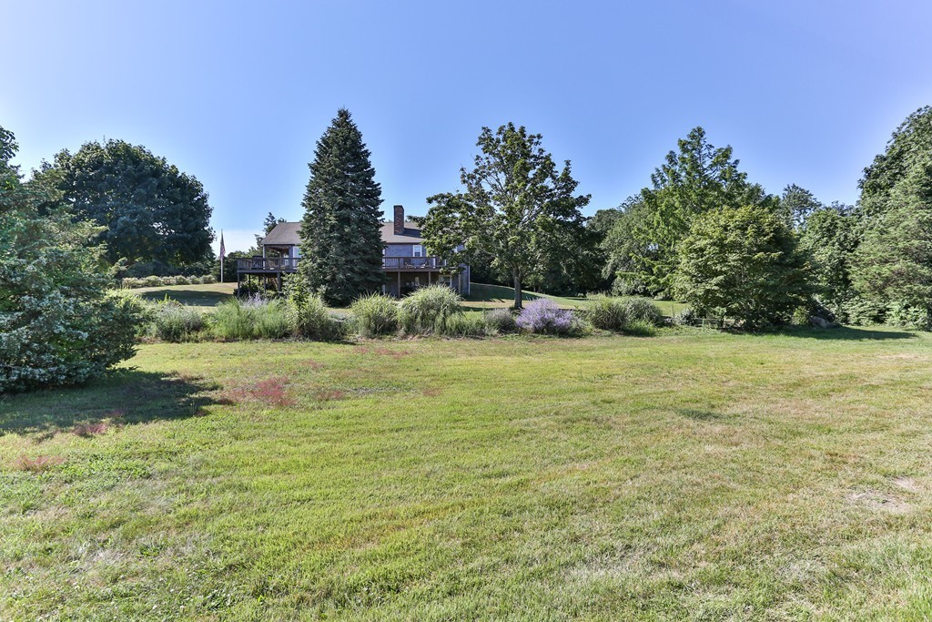 75 Deacon Court Barnstable, MA 02630 - Photo 30 of 30 a view of a garden with trees