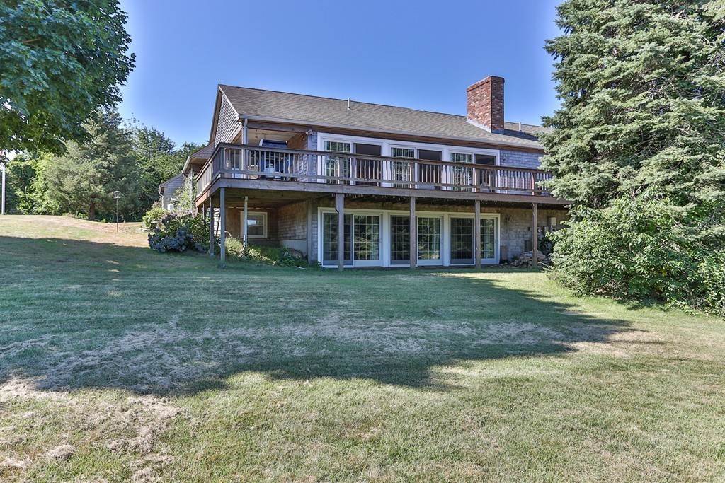 75 Deacon Court Barnstable, MA 02630 - Photo 4 of 30 a view of a house with a yard