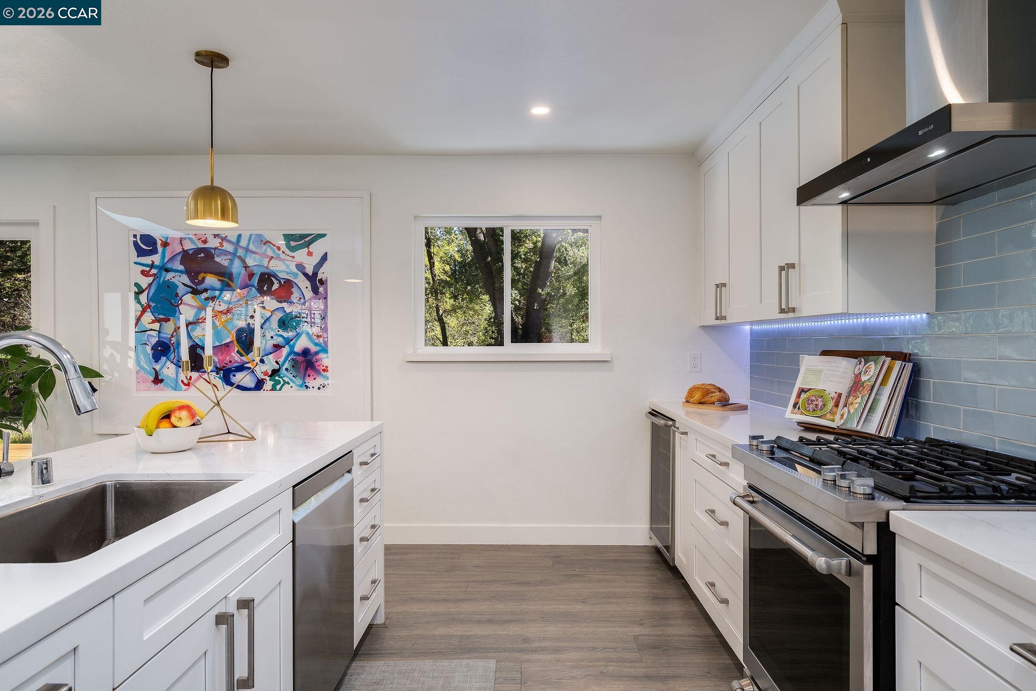 1886 Green Valley Road Alamo, CA 94507 - Photo 12 of 32 a kitchen with stainless steel appliances a stove a sink and a refrigerator
