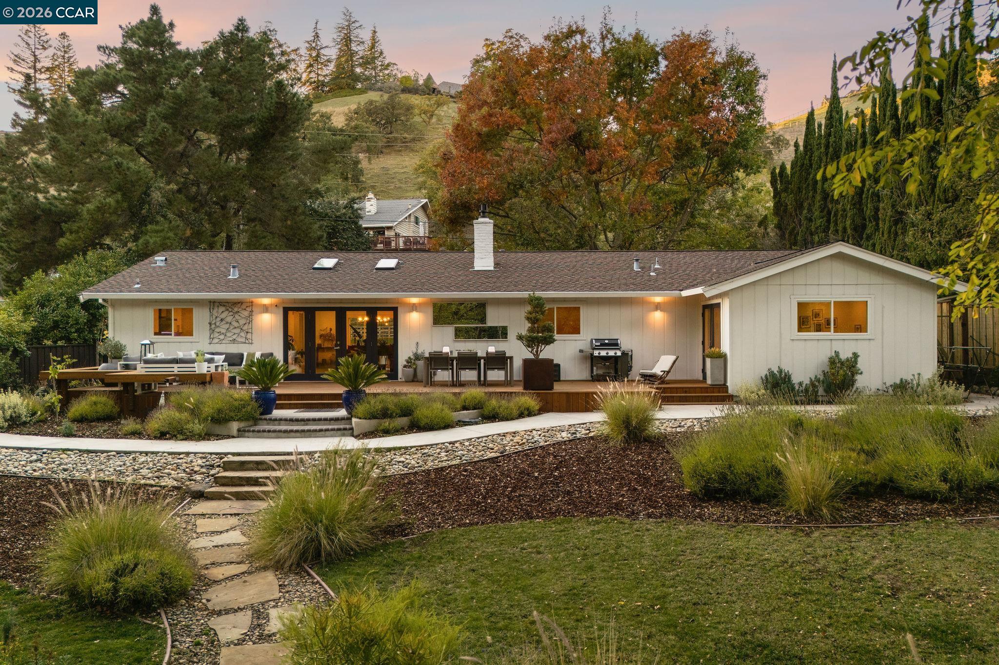 1886 Green Valley Road Alamo, CA 94507 - Photo 15 of 32 a view of a house with furniture and fire pit