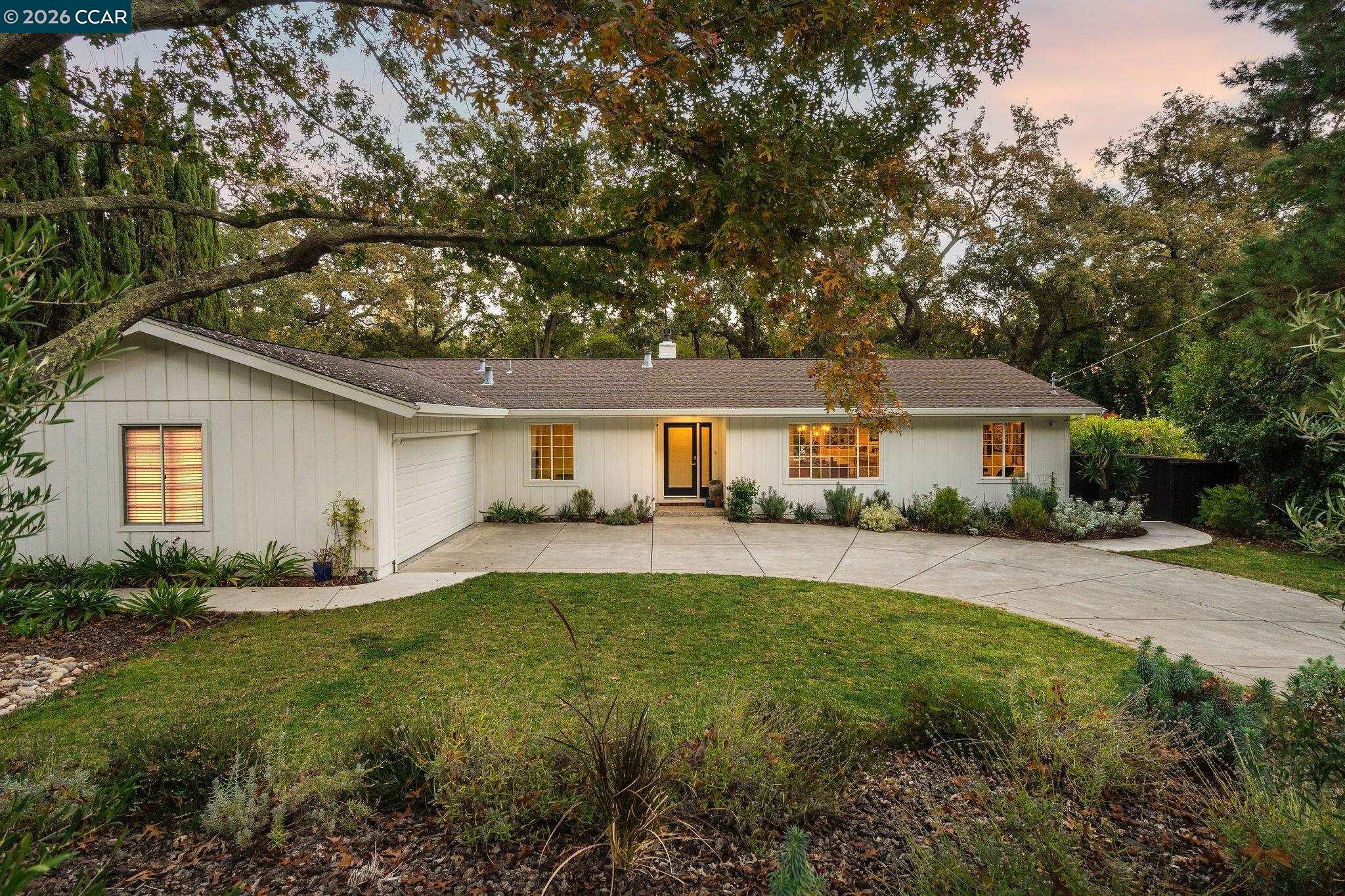 1886 Green Valley Road Alamo, CA 94507 - Photo 2 of 32 a front view of house with yard and green space