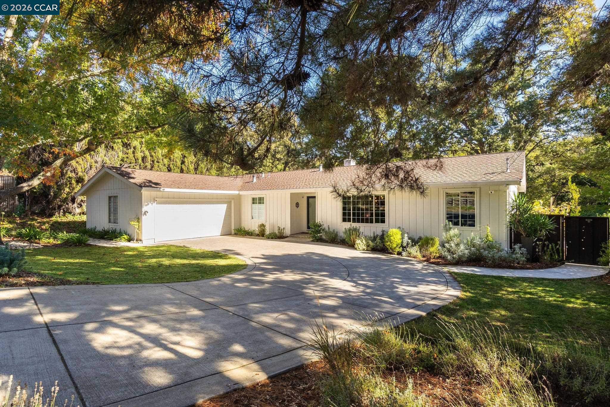 1886 Green Valley Road Alamo, CA 94507 - Photo 3 of 32 a view of a house with a yard and large tree