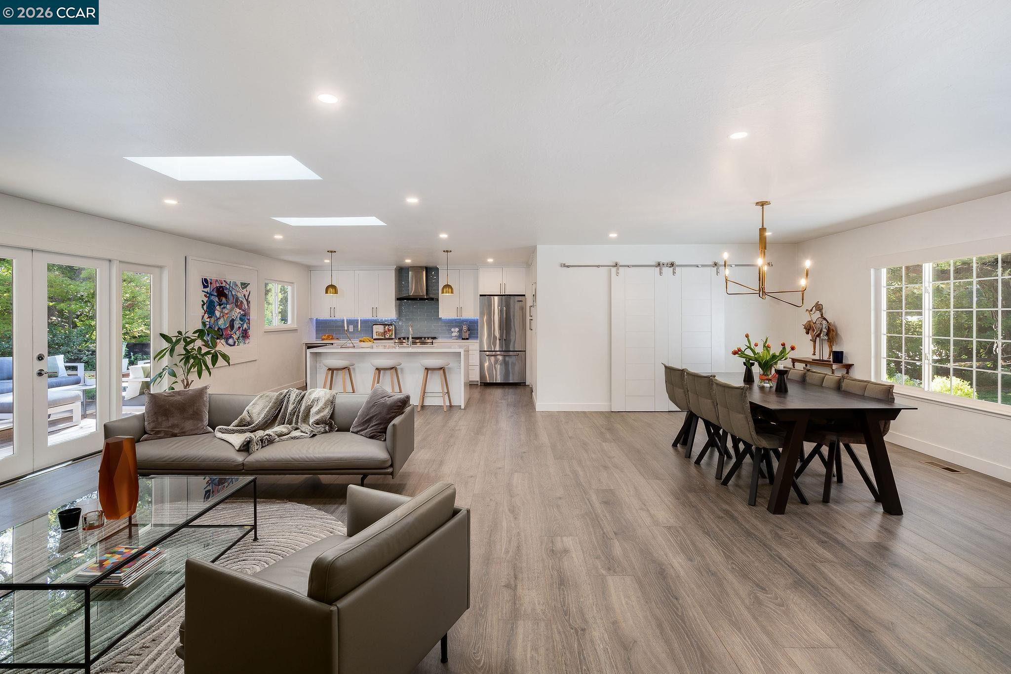 1886 Green Valley Road Alamo, CA 94507 - Photo 5 of 32 a view of a dining room with furniture and wooden floor