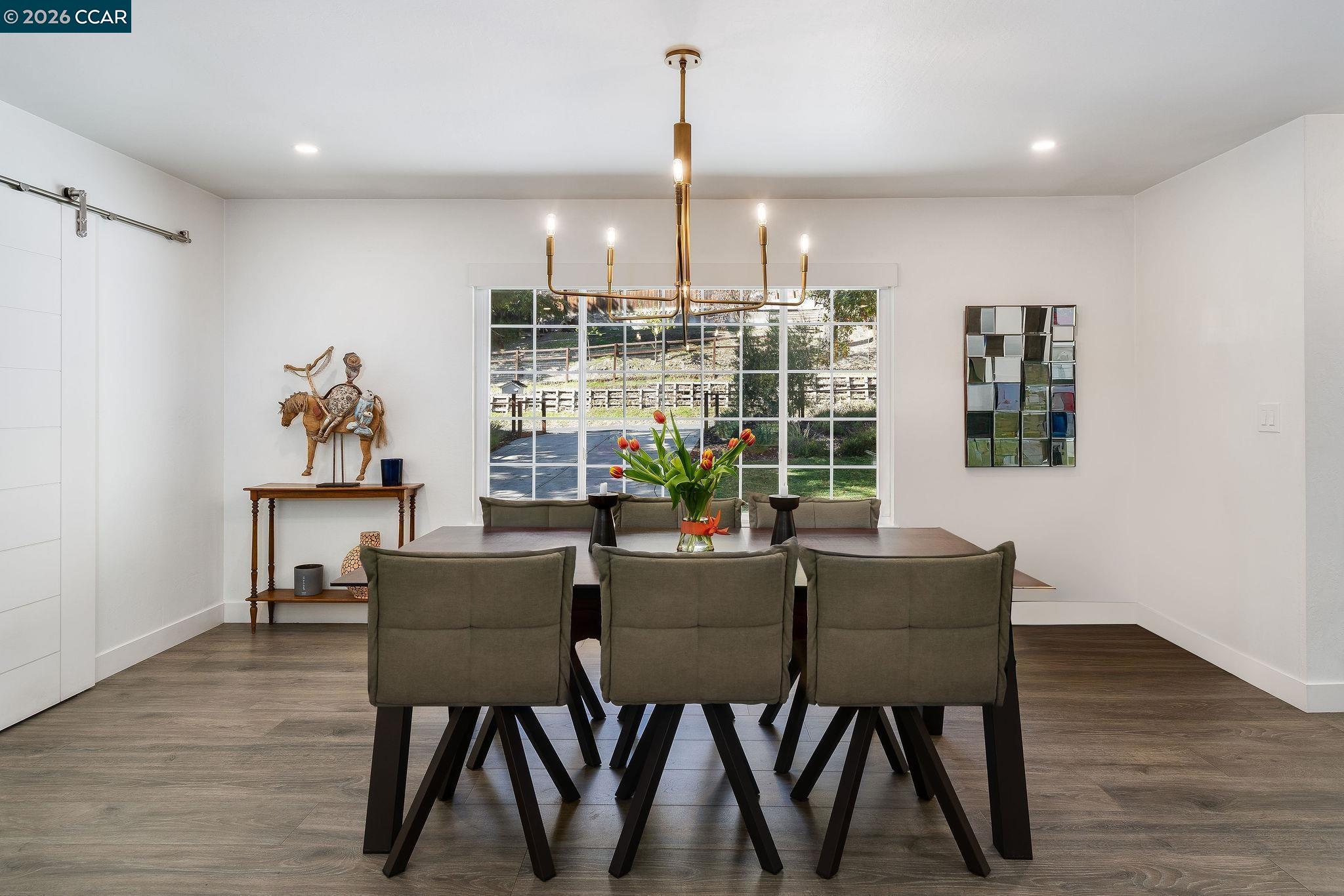 1886 Green Valley Road Alamo, CA 94507 - Photo 6 of 32 a view of a dining room with furniture window and wooden floor